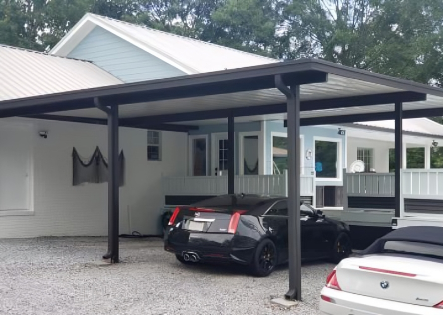 A car parked under aluminum carport